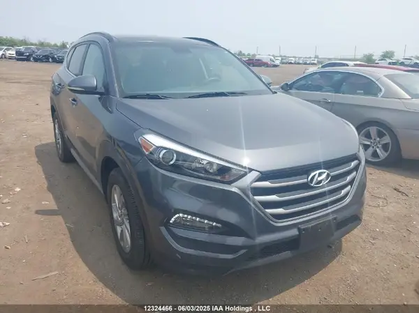 KM8J3CA43JU774862 2018 HYUNDAI TUCSON - Image 1