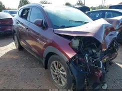 KM8J3CA44GU036318 2016 HYUNDAI TUCSON