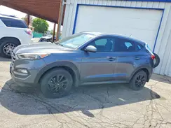 KM8J3CA44GU041048 2016 HYUNDAI TUCSON