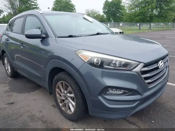 KM8J3CA44GU057041 2016 HYUNDAI TUCSON - Image 1