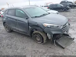 KM8J3CA44GU104259 2016 HYUNDAI TUCSON