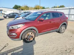 KM8J3CA44GU126827 2016 HYUNDAI TUCSON