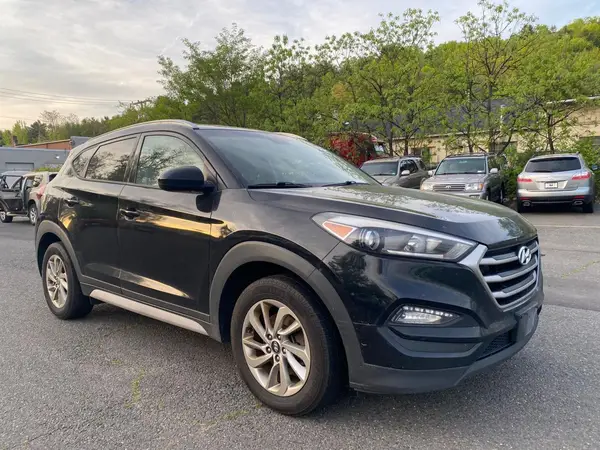 KM8J3CA44HU420469 2017 HYUNDAI TUCSON - Image 1