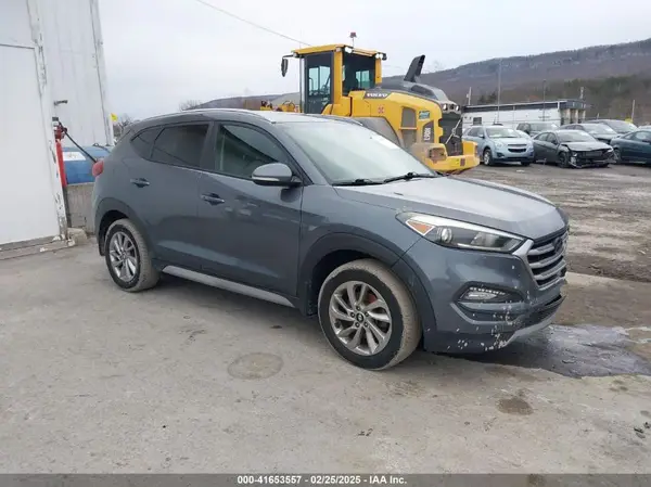 KM8J3CA44HU509720 2017 HYUNDAI TUCSON - Image 1