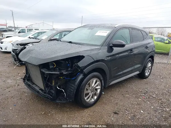 KM8J3CA44JU696818 2018 HYUNDAI TUCSON - Image 2