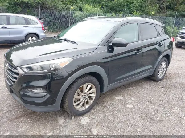 KM8J3CA45GU041303 2016 HYUNDAI TUCSON - Image 2