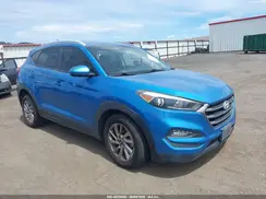 KM8J3CA45GU088282 2016 HYUNDAI TUCSON