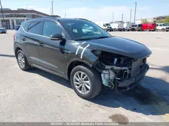 KM8J3CA45GU102083 2016 HYUNDAI TUCSON
