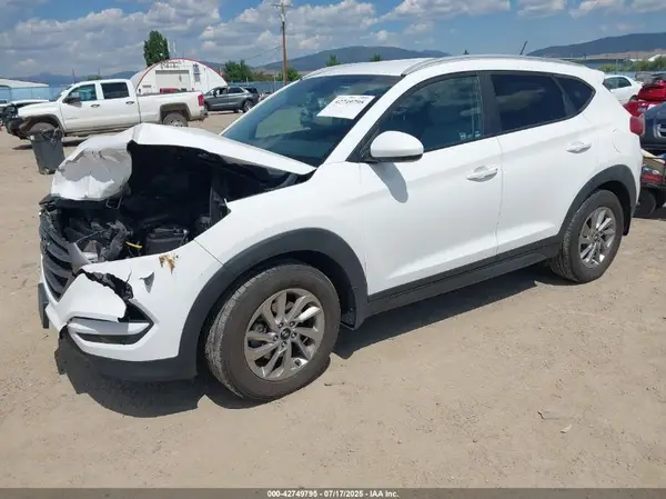 KM8J3CA45GU162610 2016 HYUNDAI TUCSON - Image 2