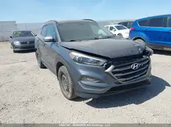 KM8J3CA45GU165927 2016 HYUNDAI TUCSON