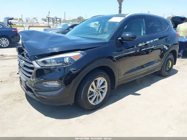 KM8J3CA45GU253053 2016 HYUNDAI TUCSON - Image 2