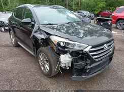 KM8J3CA45JU779870 2018 HYUNDAI TUCSON