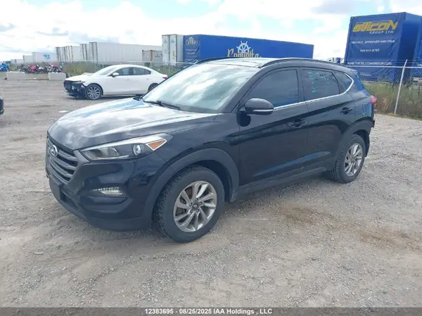 KM8J3CA46GU021724 2016 HYUNDAI TUCSON - Image 2