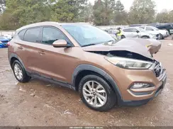 KM8J3CA46GU037860 2016 HYUNDAI TUCSON