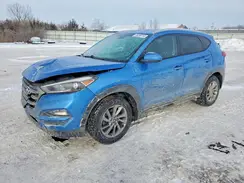 KM8J3CA46GU049832 2016 HYUNDAI TUCSON
