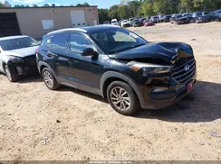 KM8J3CA46GU059230 2016 HYUNDAI TUCSON