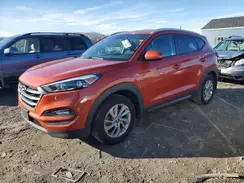 KM8J3CA46GU084242 2016 HYUNDAI TUCSON