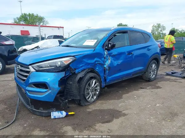KM8J3CA46GU158341 2016 HYUNDAI TUCSON - Image 2
