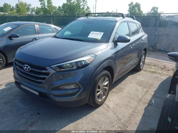 KM8J3CA46GU188617 2016 HYUNDAI TUCSON - Image 2