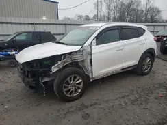 KM8J3CA46GU222989 2016 HYUNDAI TUCSON
