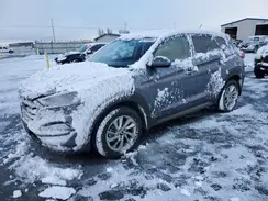 KM8J3CA46GU240165 2016 HYUNDAI TUCSON
