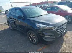 KM8J3CA47GU038371 2016 HYUNDAI TUCSON