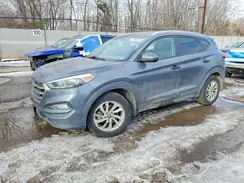 KM8J3CA47GU057552 2016 HYUNDAI TUCSON