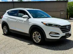 KM8J3CA47GU184124 2016 HYUNDAI TUCSON