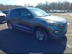 KM8J3CA47GU208566 2016 HYUNDAI TUCSON