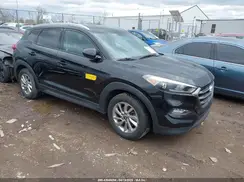KM8J3CA47GU215257 2016 HYUNDAI TUCSON