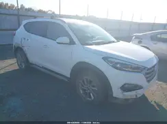 KM8J3CA47JU609557 2018 HYUNDAI TUCSON
