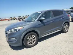 KM8J3CA47JU666745 2018 HYUNDAI TUCSON