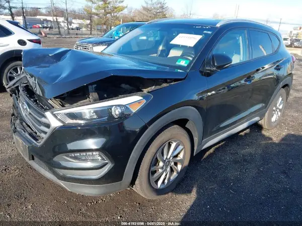 KM8J3CA47JU689409 2018 HYUNDAI TUCSON - Image 2