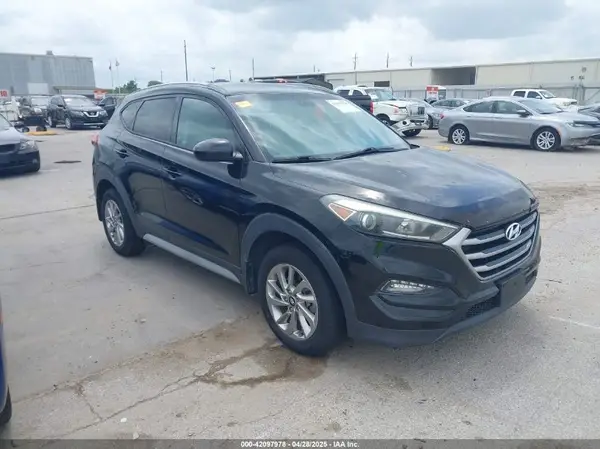 KM8J3CA47JU696408 2018 HYUNDAI TUCSON - Image 1
