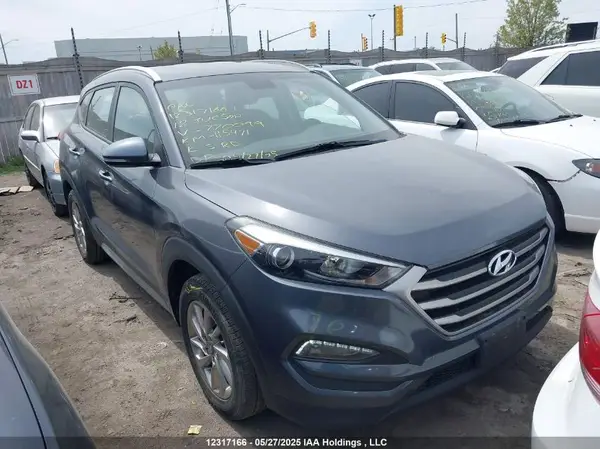 KM8J3CA47JU770099 2018 HYUNDAI TUCSON - Image 1