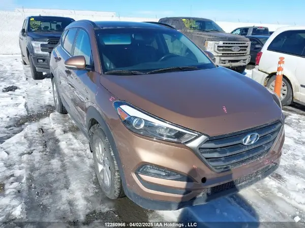 KM8J3CA48GU037438 2016 HYUNDAI TUCSON - Image 1