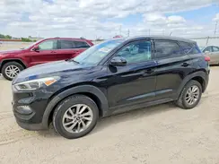 KM8J3CA48GU058208 2016 HYUNDAI TUCSON