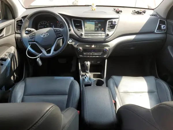 KM8J3CA48GU104720 2016 HYUNDAI TUCSON - Image 8