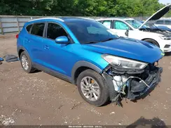 KM8J3CA48GU129889 2016 HYUNDAI TUCSON