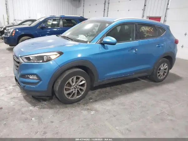 KM8J3CA48GU130153 2016 HYUNDAI TUCSON - Image 2