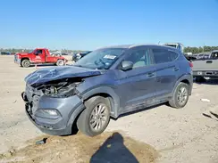 KM8J3CA48GU208205 2016 HYUNDAI TUCSON