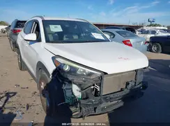 KM8J3CA48GU248042 2016 HYUNDAI TUCSON