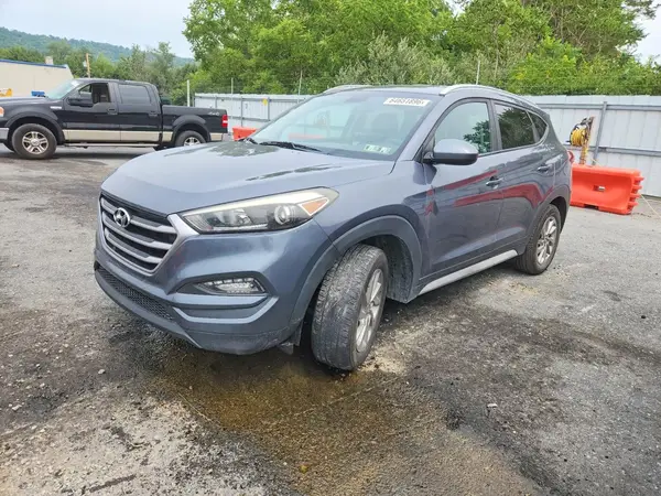 KM8J3CA48HU437310 2017 HYUNDAI TUCSON - Image 1