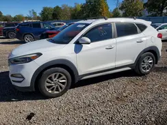 KM8J3CA48HU556829 2017 HYUNDAI TUCSON
