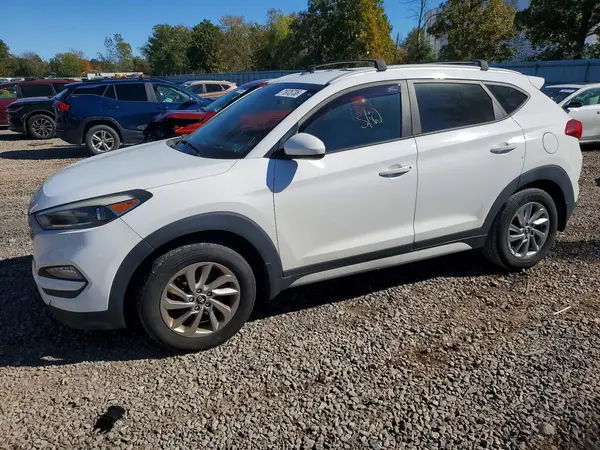 KM8J3CA48HU556829 2017 HYUNDAI TUCSON - Image 1