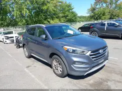 KM8J3CA48JU669248 2018 HYUNDAI TUCSON