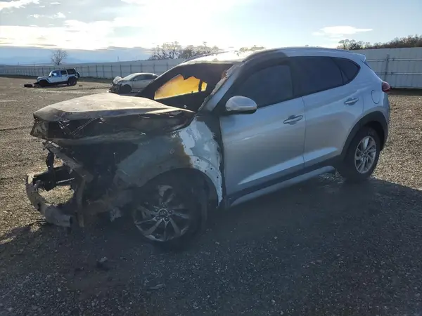 KM8J3CA48JU764893 2018 HYUNDAI TUCSON - Image 1