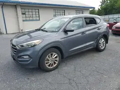 KM8J3CA49GU037450 2016 HYUNDAI TUCSON