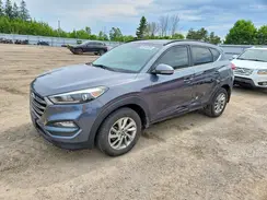 KM8J3CA49GU107285 2016 HYUNDAI TUCSON