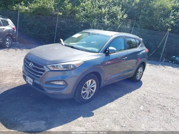 KM8J3CA49GU151660 2016 HYUNDAI TUCSON - Image 2